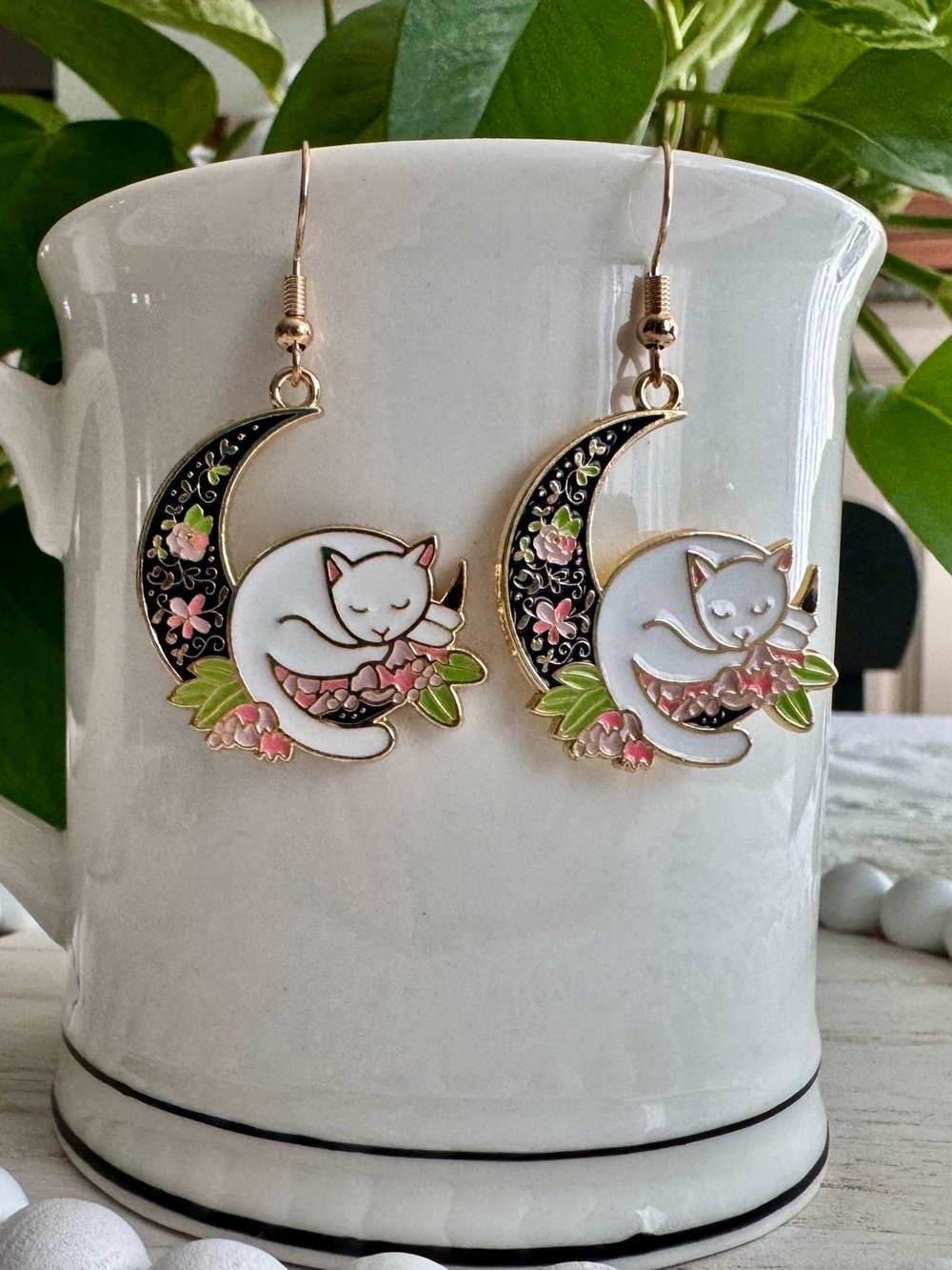 Cat on Moon Pink Floral Enamel on gold-tone metal Cats are about  1.25”